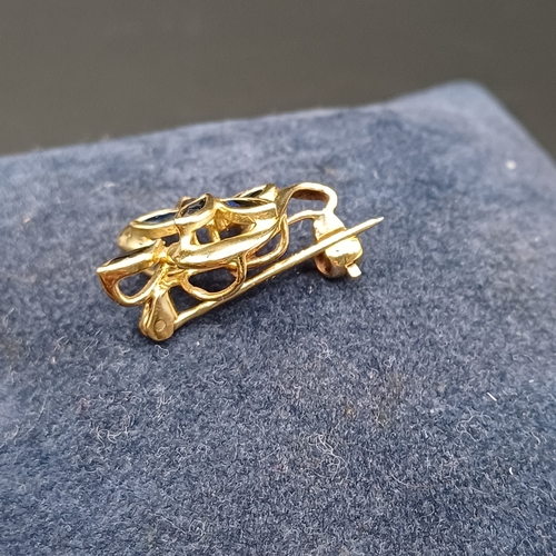 41 - Pretty Sapphire Brooch set in 9 carat yellow gold weighing 2g