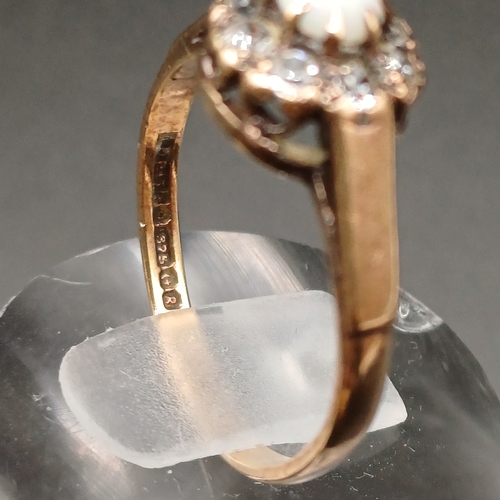 46 - Opal and White Stone Ring set in 9 carat yellow gold
- weight 2.2g
- size N / O