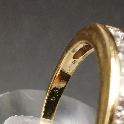 48 - Diamond Half Eternity Ring set in 18 carat yellow gold.
- weight 4g
- Size L
- Diamond weight 0.50