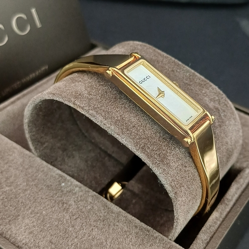 53 - Pair of Gucci Ladies Watches, both boxed with paperwork:
1.  Gucci 6800L - Silver Metal Face and Ban... 