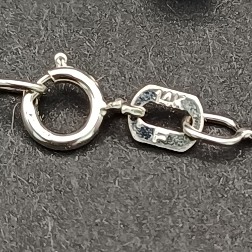 55 - Stunning 18 carat white gold Cross with Diamonds set in with approximate diamond weight of 0.30.  Th... 