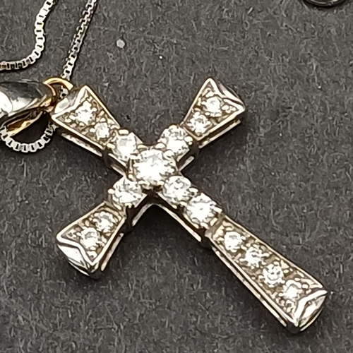 55 - Stunning 18 carat white gold Cross with Diamonds set in with approximate diamond weight of 0.30.  Th... 