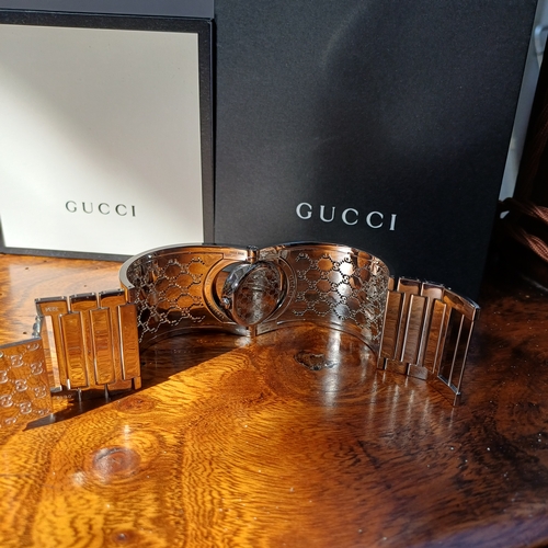 57 - Ladies Gucci Twirl Bangle Watch.  This is in excellent condition and all boxed with paperwork.