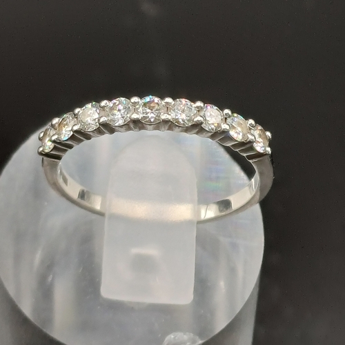 61 - Diamond Half Eternity Ring set in Platinum
- size L
- weight 2.70g