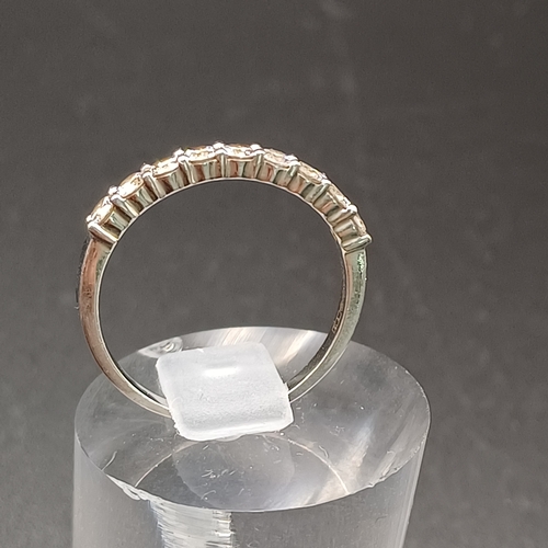 61 - Diamond Half Eternity Ring set in Platinum
- size L
- weight 2.70g