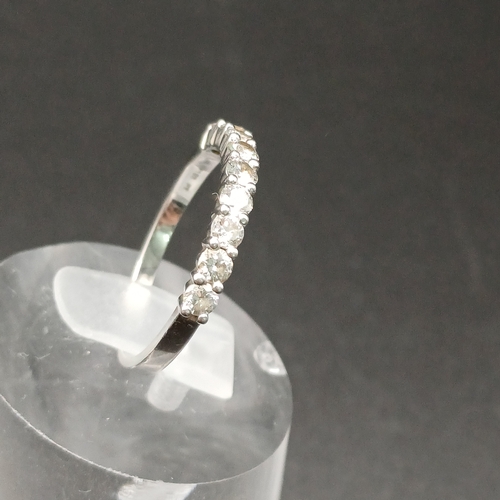 61 - Diamond Half Eternity Ring set in Platinum
- size L
- weight 2.70g