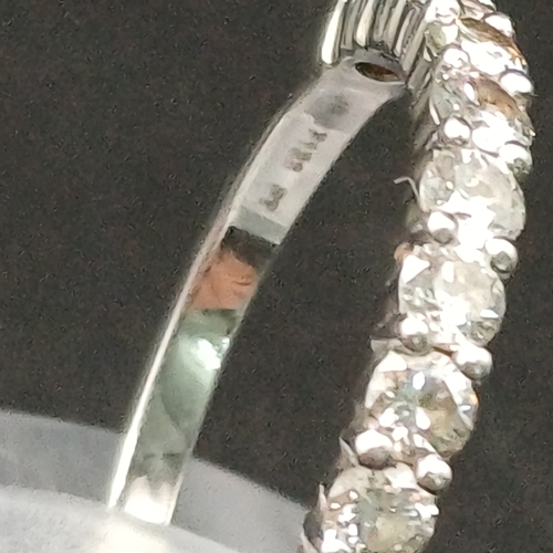 61 - Diamond Half Eternity Ring set in Platinum
- size L
- weight 2.70g