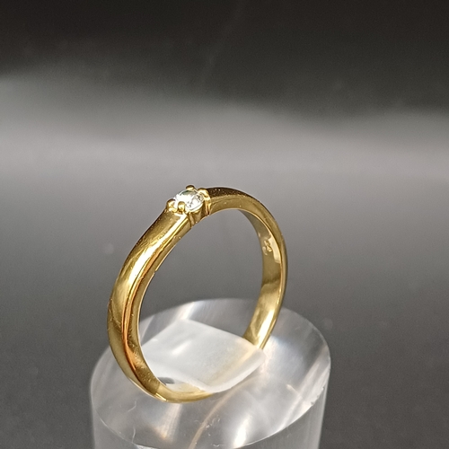 96 - Yellow 9 carat gold ring with white stone set in.  Total weight 2.3g size Q / R