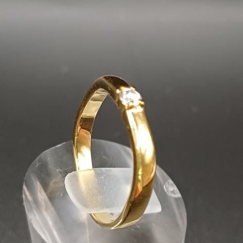 96 - Yellow 9 carat gold ring with white stone set in.  Total weight 2.3g size Q / R