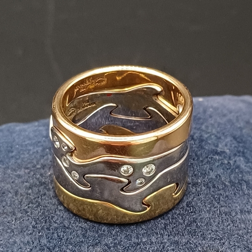 97 - Georg Jensen  Fusion Ring in Yellow and White 18 carat Gold with Diamonds Set in.
- Total weight 26g...