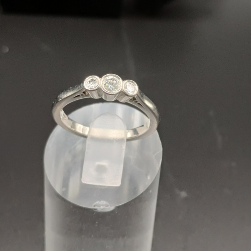 98 - Three Stone Diamond Ring set in Palladium
- weight 3.7g
- size N