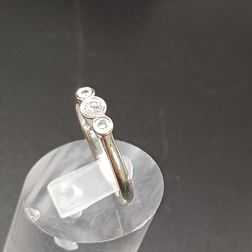 98 - Three Stone Diamond Ring set in Palladium
- weight 3.7g
- size N