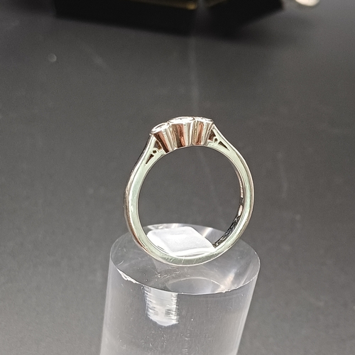 98 - Three Stone Diamond Ring set in Palladium
- weight 3.7g
- size N