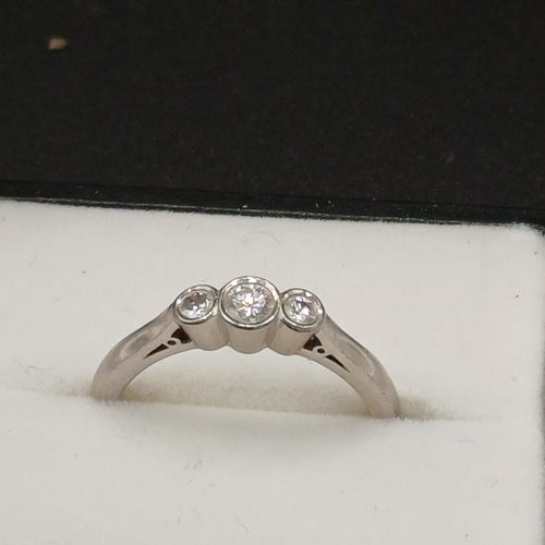 98 - Three Stone Diamond Ring set in Palladium
- weight 3.7g
- size N