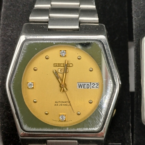 103 - Collection of Six Watches in storage case.  All watches are stainless steel cases and four have stai... 