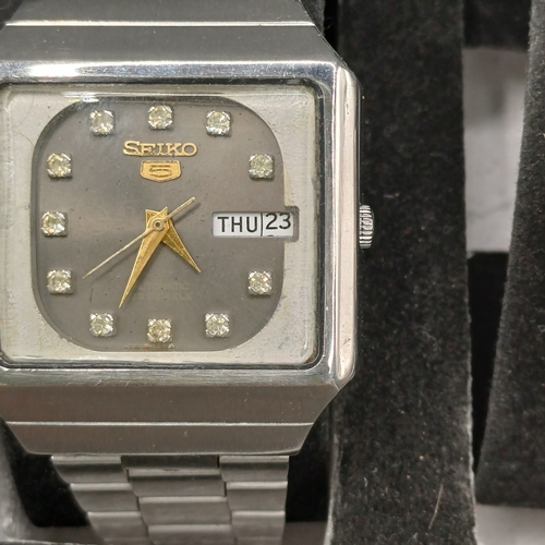 103 - Collection of Six Watches in storage case.  All watches are stainless steel cases and four have stai... 