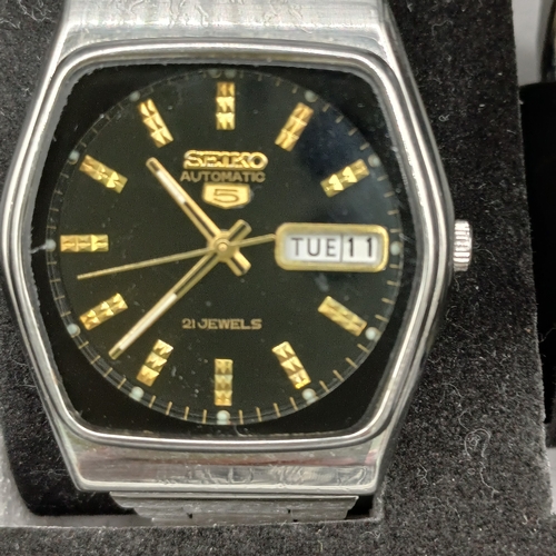 103 - Collection of Six Watches in storage case.  All watches are stainless steel cases and four have stai... 