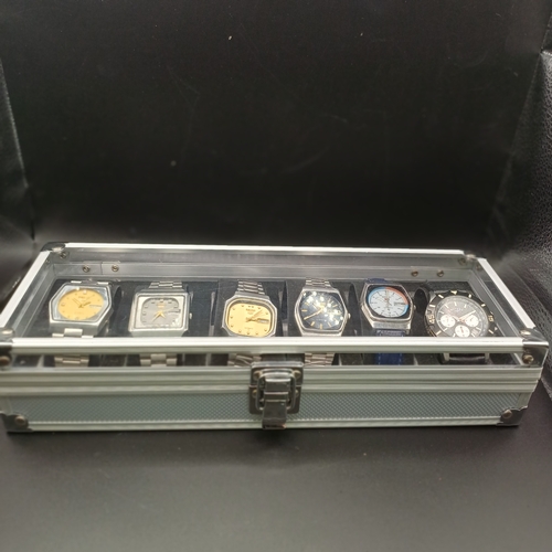 103 - Collection of Six Watches in storage case.  All watches are stainless steel cases and four have stai... 