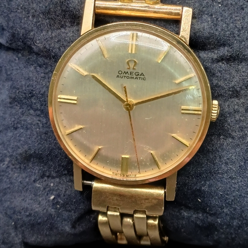 105 - Vintage Omega Automatic 9 carat gold watch (case and strap) circa 1950's in good working order and i... 