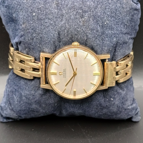 105 - Vintage Omega Automatic 9 carat gold watch (case and strap) circa 1950's in good working order and i... 