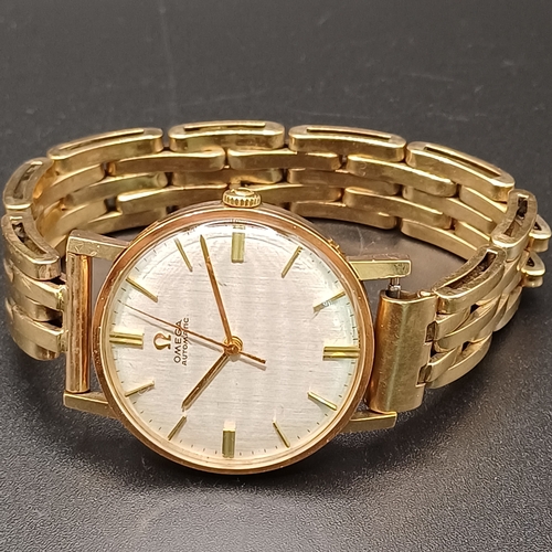105 - Vintage Omega Automatic 9 carat gold watch (case and strap) circa 1950's in good working order and i... 