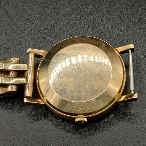 105 - Vintage Omega Automatic 9 carat gold watch (case and strap) circa 1950's in good working order and i... 