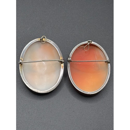 6 - Two stunning cameo brooches on silver setting.