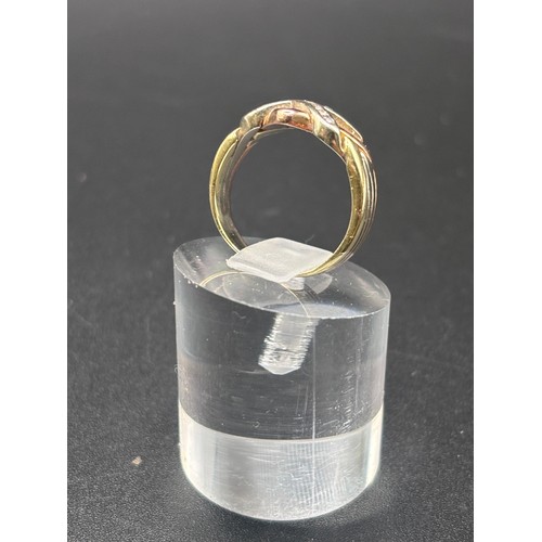 13 - 9ct yellow gold with diamond cluster in the style of a puzzle ring.
Size K / L: Weight 4.6g