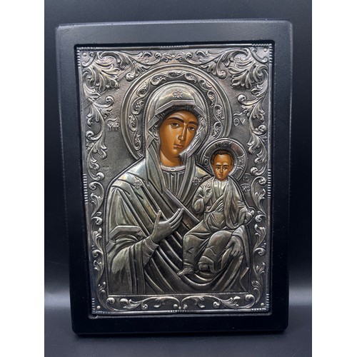 60 - This is a Greek Orthodox icon depicting the Virgin Mary and Child, Byzantine art style in silver 925... 