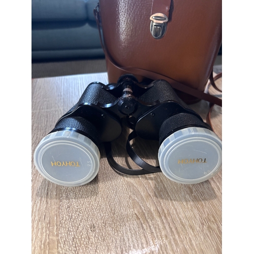 82 - This item is a pair of vintage Hyoh Tokyo 12x50 binoculars, featuring coated optics and a field of v... 