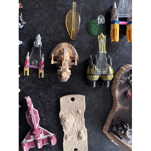 112 - A collection of vintage Star Wars Micro vehicles, figures, and playsets,  manufactured in the 1990s.... 