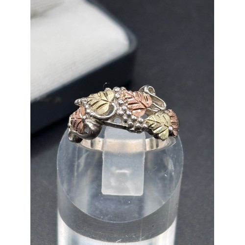 26 - Black Hills Gold tri-tone leaf ring, crafted from sterling silver with 10k rose and green gold.
Size... 
