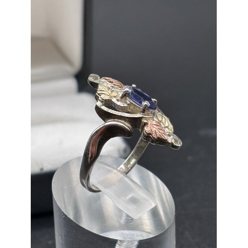 27 - Black Hills Gold ring, crafted in silver with signiture tri gold  leaf motifs, 10k yellow gold and r... 