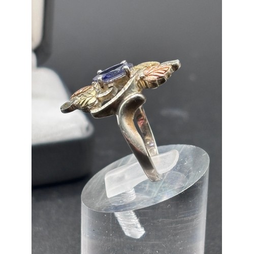 27 - Black Hills Gold ring, crafted in silver with signiture tri gold  leaf motifs, 10k yellow gold and r... 