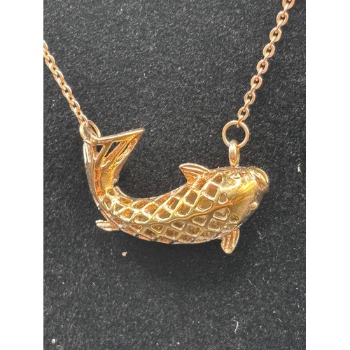 28 - Stunning Piece of Cartier in the design of a Koi fish. In 14 carat gold weighing 7g.