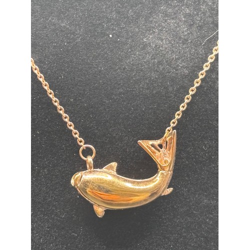 28 - Stunning Piece of Cartier in the design of a Koi fish. In 14 carat gold weighing 7g.