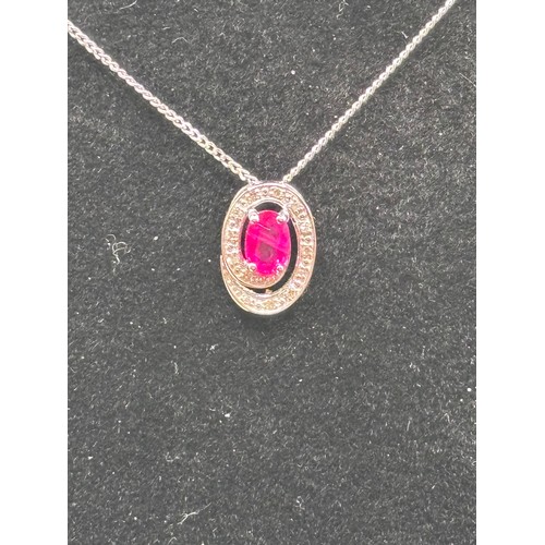 29 - White 9ct gold necklace and ruby pendant.
Weight 2.5g