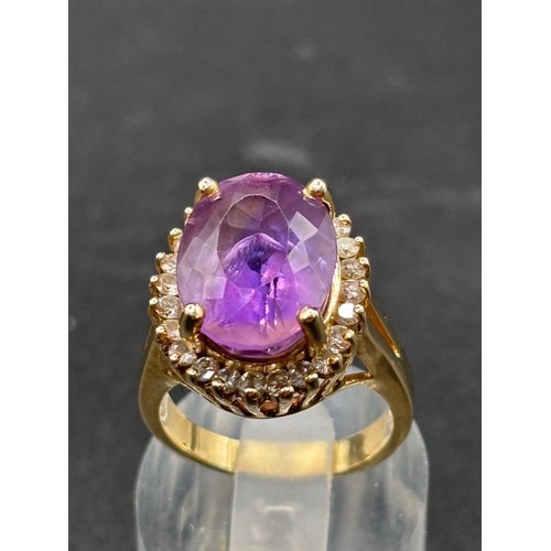 30 - Stunning 18ct yellow gold ring with huge Amethyst and diamond setting. Size R/S weighs 11g