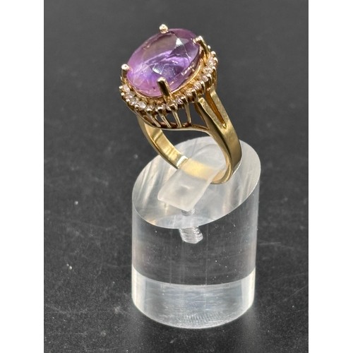 30 - Stunning 18ct yellow gold ring with huge Amethyst and diamond setting. Size R/S weighs 11g