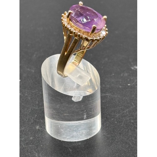 30 - Stunning 18ct yellow gold ring with huge Amethyst and diamond setting. Size R/S weighs 11g