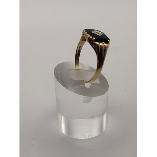 32 - 9ct yellow gold  Black Onyx and diamond signet ring.
weighs 2.54g 
Size u/v
size  u/ v