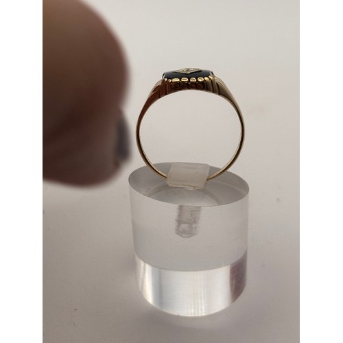 32 - 9ct yellow gold  Black Onyx and diamond signet ring.
weighs 2.54g 
Size u/v
size  u/ v