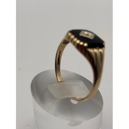 32 - 9ct yellow gold  Black Onyx and diamond signet ring.
weighs 2.54g 
Size u/v
size  u/ v