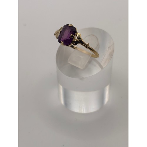 33 - 9ct yellow gold with solitare amethyst stone and decorative shoulder. 
Weighs 1.2g
Size p