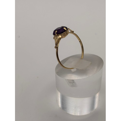 33 - 9ct yellow gold with solitare amethyst stone and decorative shoulder. 
Weighs 1.2g
Size p