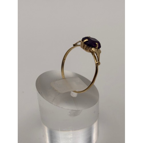 33 - 9ct yellow gold with solitare amethyst stone and decorative shoulder. 
Weighs 1.2g
Size p