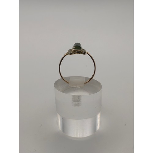 34 - 9ct yellow gold vintage ring with rectangular green jade gemstone.
Weighs 1.57
Size n/o