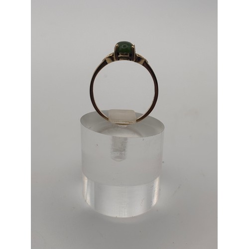 39 - Natural turquoise cabochon ring in 9ct yellow gold setting, 
weighs 3.14g
Size P