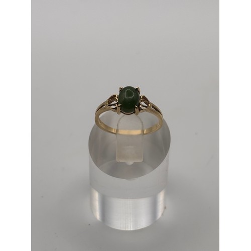 39 - Natural turquoise cabochon ring in 9ct yellow gold setting, 
weighs 3.14g
Size P