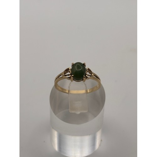 39 - Natural turquoise cabochon ring in 9ct yellow gold setting, 
weighs 3.14g
Size P